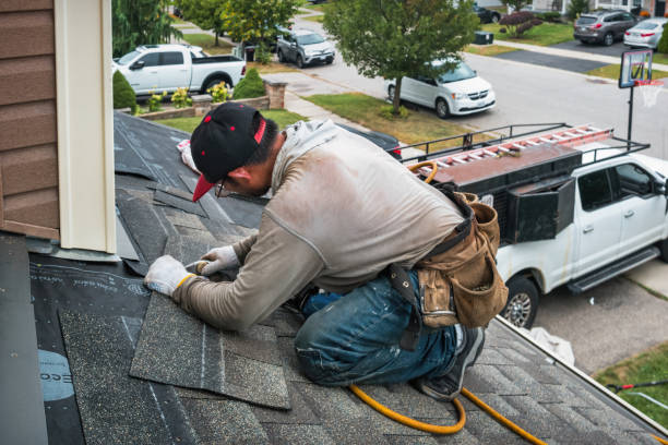 Professional Gutter Installation technician working in Byron Center, MI